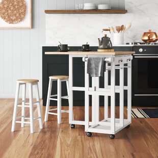 Kitchen island best sale with hideaway stools